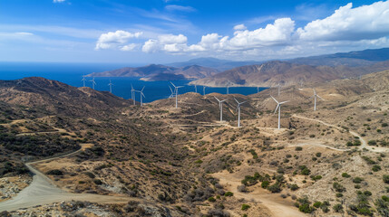 Aerial view of expansive wind farm with numerous turbines generating clean energy, symbolizing sustainable power and environmental conservation