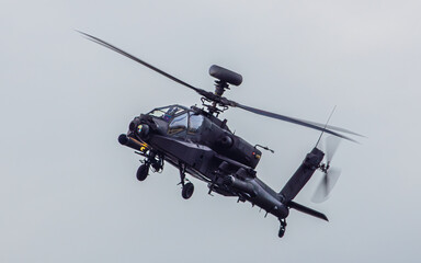 Military anti tank helicopter at speed.