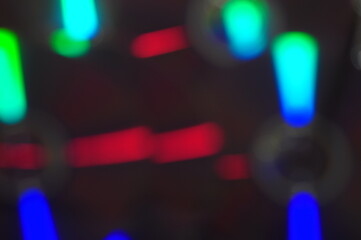 Compact disc, neon light, blured 