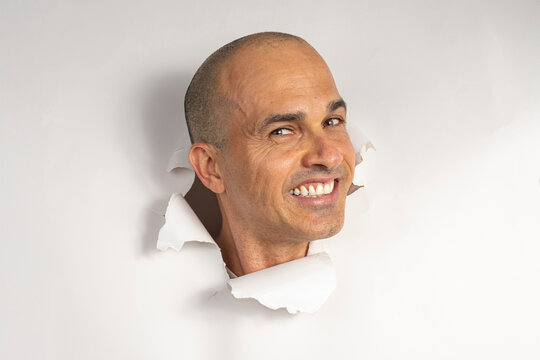 48 year old Brazilian man in casual clothes, only his head on a torn cardboard, showing emotions_8.