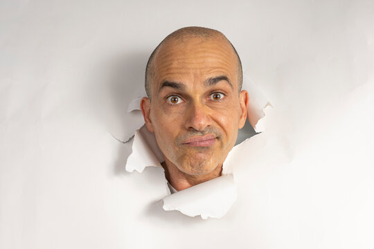 48 year old Brazilian man in casual clothes, only his head on a torn cardboard, showing emotions_12.