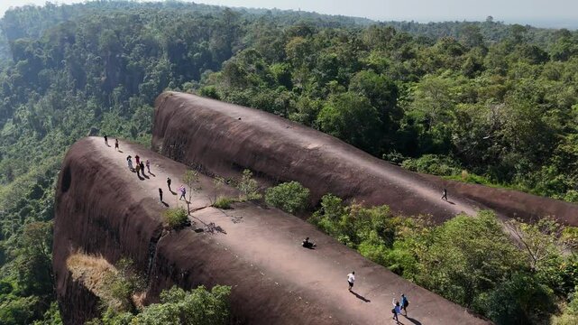 Aerial view of an iconic Three Whales Rock (in Thai called Hin Sam Wan) a 75-million-year-old rock formation protruding out of a mountain in Phou Sing, Bueng Kan Province, Thailand.