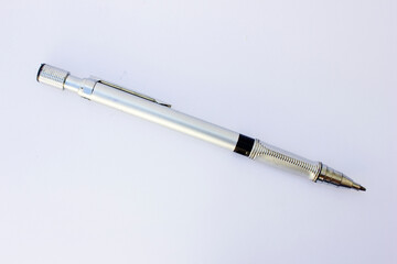 Silver mechanical pencil. This mechanical pencil is more widely used for school children or people who work in offices.