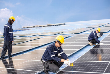 Engineer team installs solar cells check installation solar cell on the roof Sustainable energy industry concept Renewable energy solutions for climate change