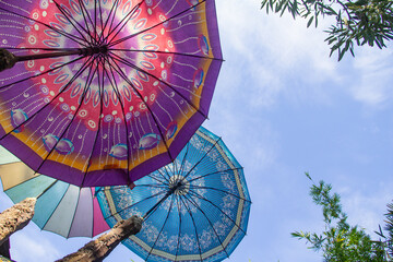 Colorful umbrellas decorated with blue daytime sky