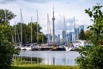 Fototapeta premium Boats at The Royal Canadian Yacht Club in the Toronto Islands. Toronto, Canada - August 22, 2024.