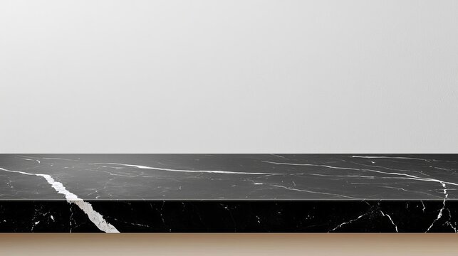 Smooth black marble countertop with subtle highlights emphasizing the sleek surface and refined white veining, ideal for interiors that convey luxury and sophistication