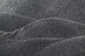 The strangeness of Black sand beach at Ao Thong Yee, Khanom District, Nakhon Si Thammarat Province,...