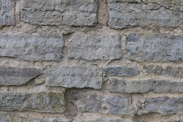 The texture of the destroyed brickwork of the Middle Ages. Preserved fortress walls.