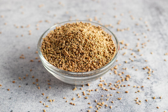 Ajwain, also known as carom seeds, is a spice with a strong, bitter flavor, often used in Indian cooking for its digestive properties.
