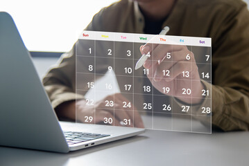 A person is interacting with a holographic calendar to organize tasks and meetings.Visualize your schedule with a digital calendar and timeline From business management to marketing.