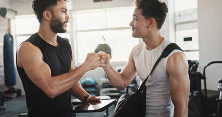 Fitness, men and fist bump in gym for workout success, wellness challenge or training teamwork....