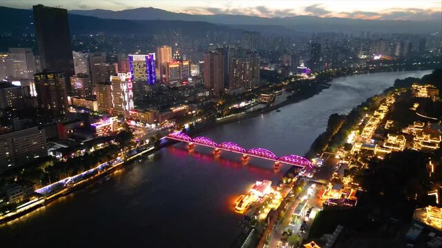 LANZHOU, CHINA- The aerial cityscape of  downtown and yellow river in Gansu province, Lanzhou city. The must landmark to visit of tourists.