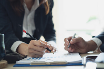 Business team have a discussion on financial report, business analyzing marketing data at office. Bookkeeping, document for financial planning, accounting and business budget management, close up