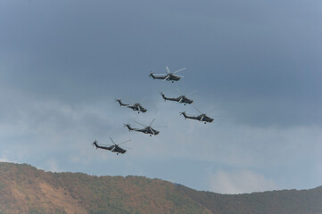 Hydroaviation show - 2014. Golden eagles. Russian combat helicopter Mi-28N, night hunter (NATO: Havoc). Four Mi-28N helicopters perform group aerobatics. Gelendzhik, Russia, September 4, 2014