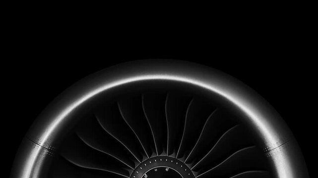 Jet engine against a black background, showcasing the spinning details of the aircraft's turbojet, highlighting its power and precision. Perfect for any aviation, engineering or aerospace technology.