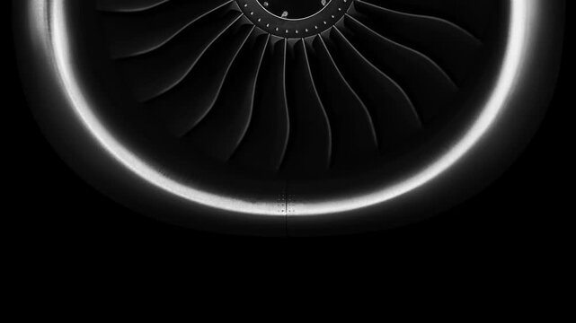 Jet engine against a black background, showcasing the spinning details of the aircraft's turbojet, highlighting its power and precision. Perfect for any aviation, engineering or aerospace technology.