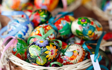 Obraz premium Colorful and painted easter eggs in traditional Easter market. Easter celebration is the most ancient and Christian holiday. Vienna. Austria.