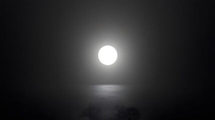 black background with a bright, glowing white light at the center, softly radiating outward eclipse