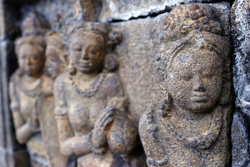 Obraz premium Borobudur, 9th-century Mahayana Buddhist temple. UNESCO World Heritage. Bas-relief dispicting the life of Buddha. Java. Indonesia.