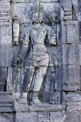Prambanan 9th century Hindu temple.  Detail of bas-relief carving on wall.  Java. Indonesia.