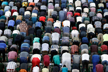 Fototapeta premium Al Akbar Surabaya National Mosque. Muslim men praying together at Friday prayer. Surabaya. Indonesia.