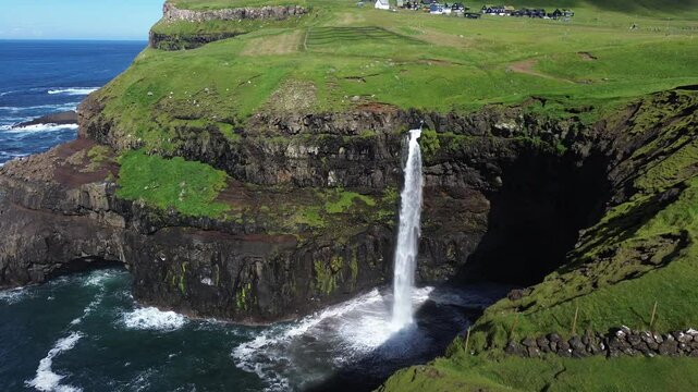Mulafossur waterfall in Gasadalur village, Vagar Island of the Faroe Islands, Denmark. 