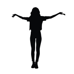 A woman is standing in the air with her arms outstretched. She is wearing a black shirt and black pants