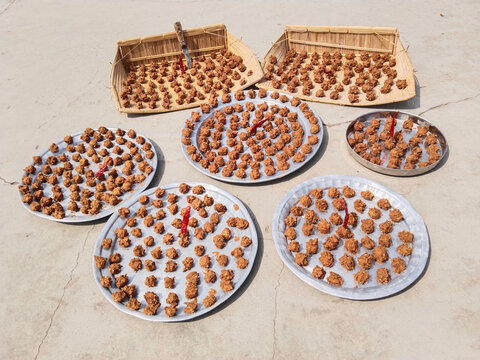 Urad Dal vadi or mong dal warian masala food drying in sunlight. it is Indian favourite food