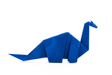 Paper dinosaur on white background. paper crafts. origami dinosaur. origami art.
