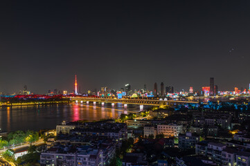 Night view of the landmark city on the two rivers and four banks of Wuhan, China
