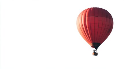 Fototapeta premium Red hot air balloon floating on a white isolated background.