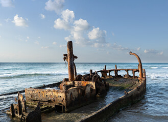 old rusty boat on the beach