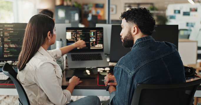 Teamwork, developer and coding training on computer screen in office for testing web application and troubleshooting. Programming, woman and advice to man on developing software solution at startup