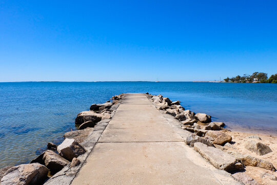 Walking along the seaside at Wynnum jetty and Manly, a beautiful sunny clear and blue sky day 