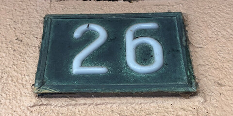 Super retro old style sign that says 26