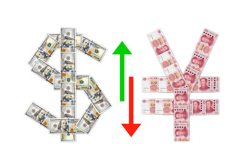 Yuan and dollars sign made from 100 US dollars and 100 yuan banknotes. CNY and Dollar exchange rate