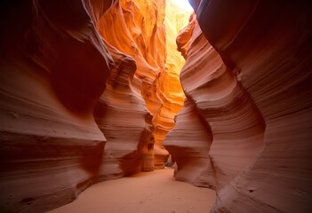 Dramatic sandstone rock formations in Antelope Canyon, with warm orange and purple hues illuminating the intricate textures and curves of the canyon walls
