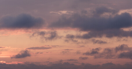 Fototapeta premium summer sunset skyscape with moving clouds