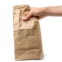 Hand holding brown paper bag isolated on white background