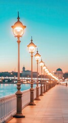Fototapeta premium Elegant street lamps illuminate a waterfront promenade under a dusky sky, creating a serene atmosphere in the evening