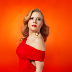 Glamorous Woman in Red Dress with Beauty Makeup