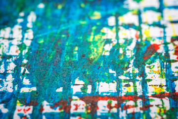 Naklejka premium Extreme close up of colorful acrylic paint texture showing brush strokes. Selective focus.