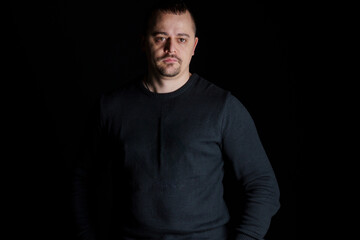 Fototapeta premium Portrait of a Man in Low-Key Lighting