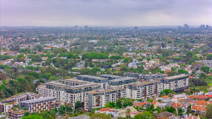 Obraz premium Aerial drone view over Sydney inner suburb of Glebe and Annandale close to Sydney Harbour NSW Australia beautiful colourful roof and tree lined streets green orange purple