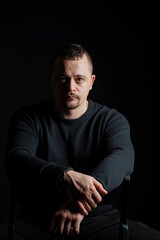 Intense Portrait of a Thoughtful Man in Low Light