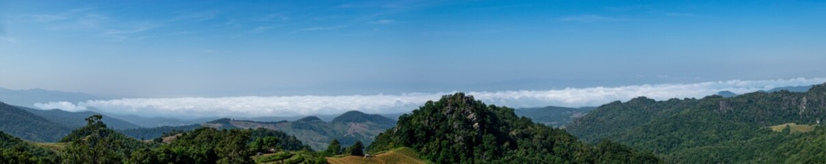 Obraz premium Majestic Mountain Layers with Endless Clouds: Nature's Harmony