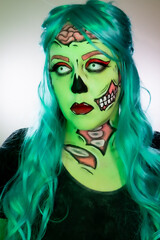 Portrait of model wearing zombie makeup in pop art style
