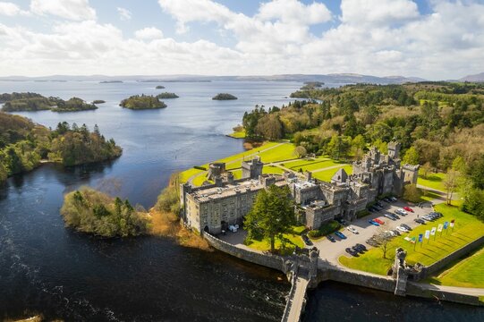 Aerial view of Ashford Castle with its majestic architecture and lakeside scenery