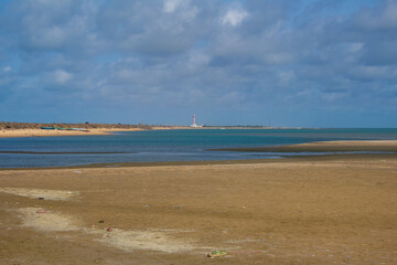 Dhanushkodi Beach, located near Arichal Munai, is known for its pristine sands and clear waters....